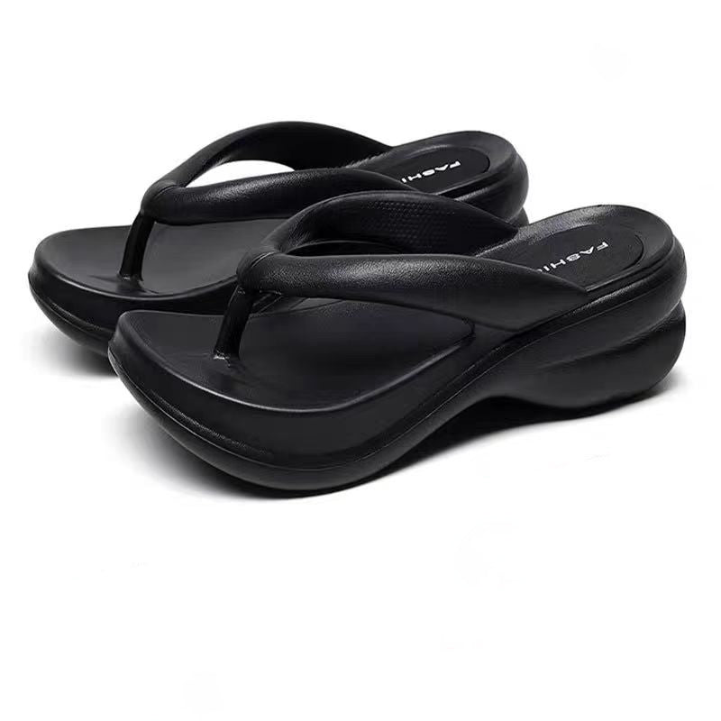 Un_par_de_chanclas_negras_de_tacón_alto_2