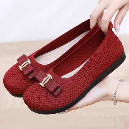 Un_par_de_zapatos_de_punto_rojos_1