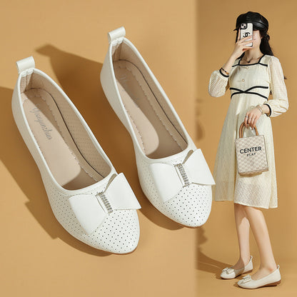 Un_par_de_zapatos_planos_blancos_3