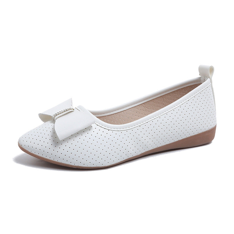 Un_par_de_zapatos_planos_plateados_1