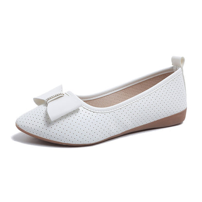 Un_par_de_zapatos_planos_plateados_1