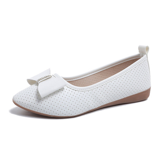 Un_par_de_zapatos_planos_plateados_1